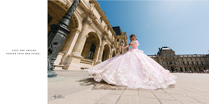 Girl in a pink quinceañera ballgown posing in front of the Louvre’s historic facade, full skirt flowing across the courtyard under bright Paris sunlight.
