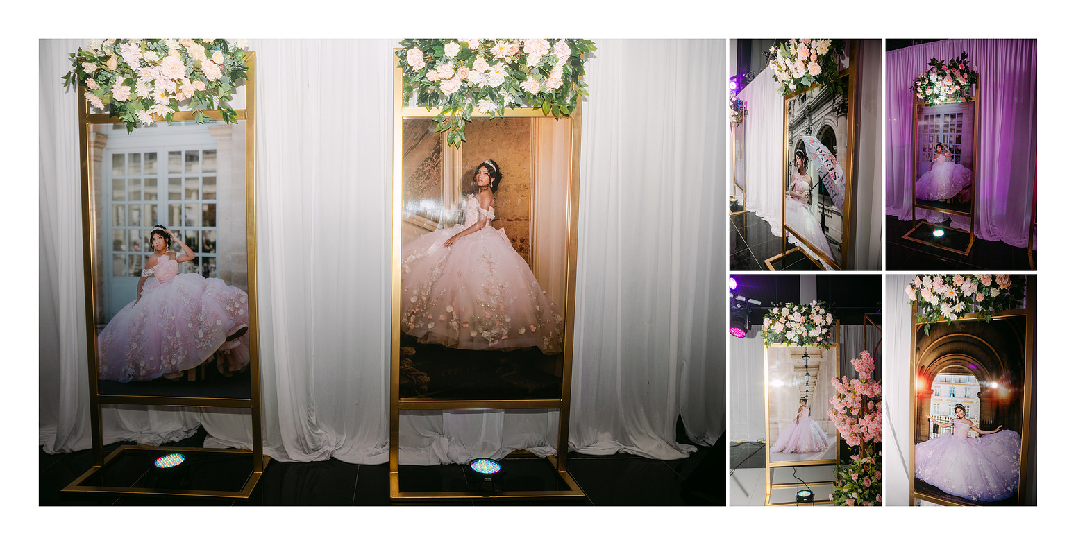 Decorated quinceañera venue featuring large photo banners from a Paris photoshoot, as guests take pictures near the displays while the celebration continues in a documentary-style setting
