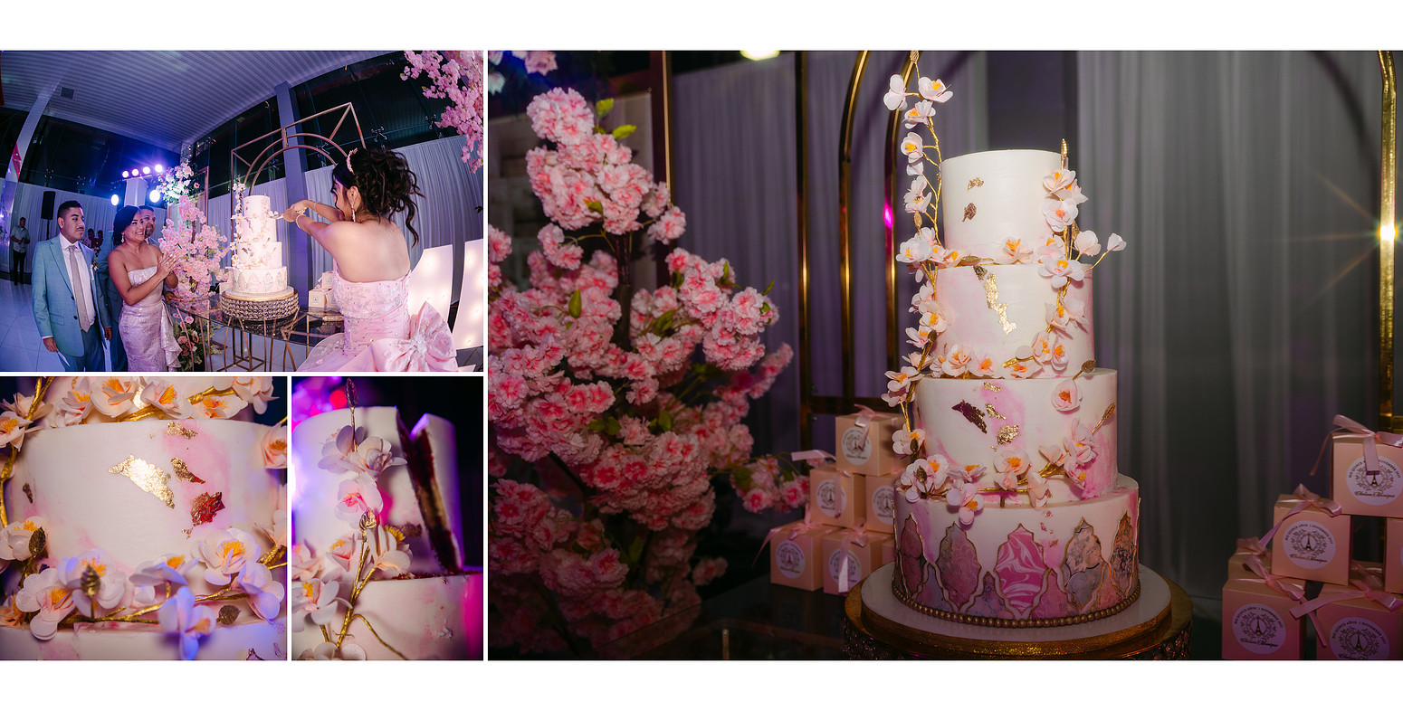Elegant quinceañera cake in powder pink tones with gold leaf details and floral accents, displayed as part of the celebration decor, symbolizing abundance and refinement.